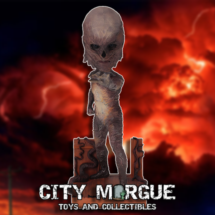 Vecna collectible bobblehead from Stranger Things, featuring detailed sculpting and a dark background with dramatic clouds.