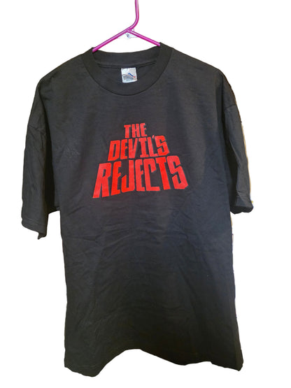 Black t-shirt featuring "The Devils Rejects" in bold red letters on the front, size XL.