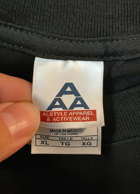 The Devils Rejects vintage promo tee tag showing size XL and brand Alstyle Apparel & Activewear.