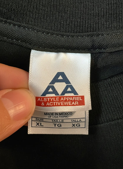 The Devils Rejects vintage promo tee tag showing size XL and brand Alstyle Apparel & Activewear.