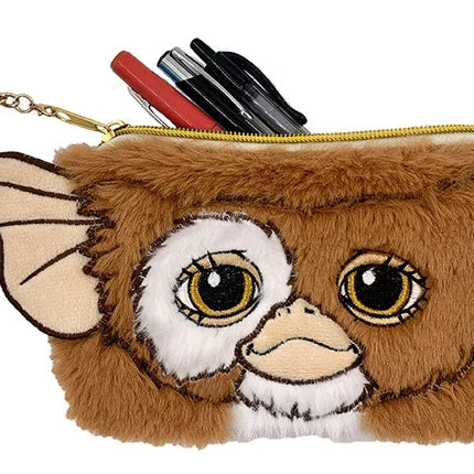 Gizmo plush accessory pouch with embroidered facial features and a fluffy texture, holding pens and markers.