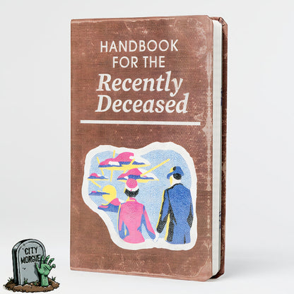 Beetlejuice: Handbook for the Recently Deceased journal with a brown cover and colorful illustration of characters.